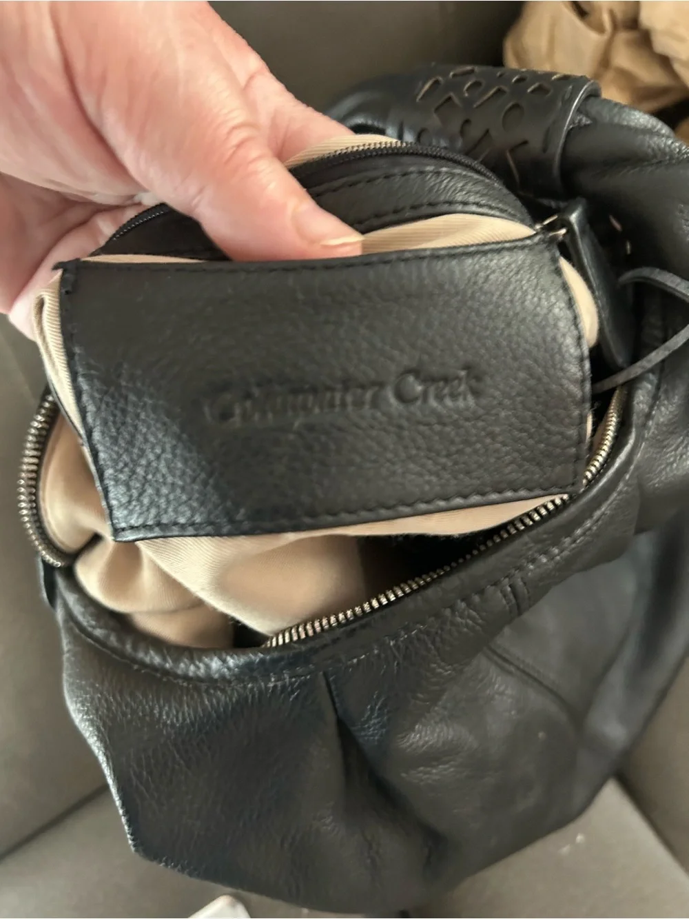 Coldwater Creek Black Leather Hobo with Tassel and Cutout Strap Accents
